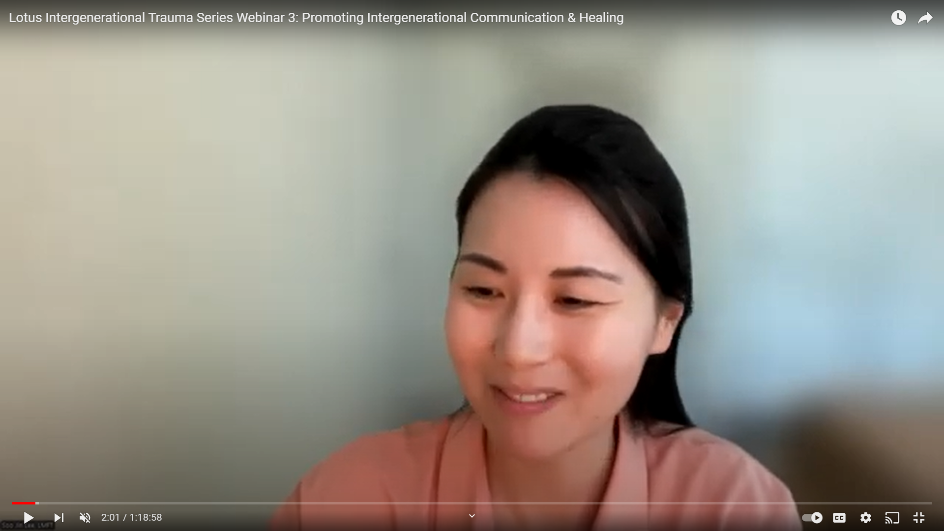 screenshot of woman speaking from webinar