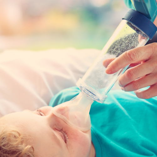 child using nebulizer