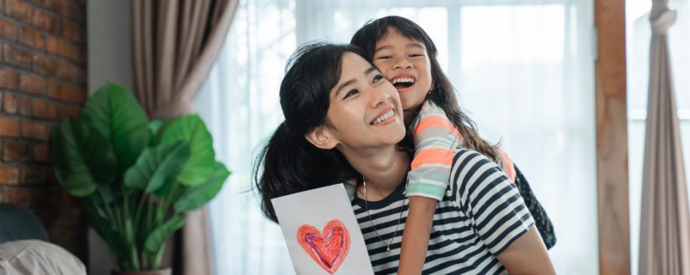 child with mother smiling