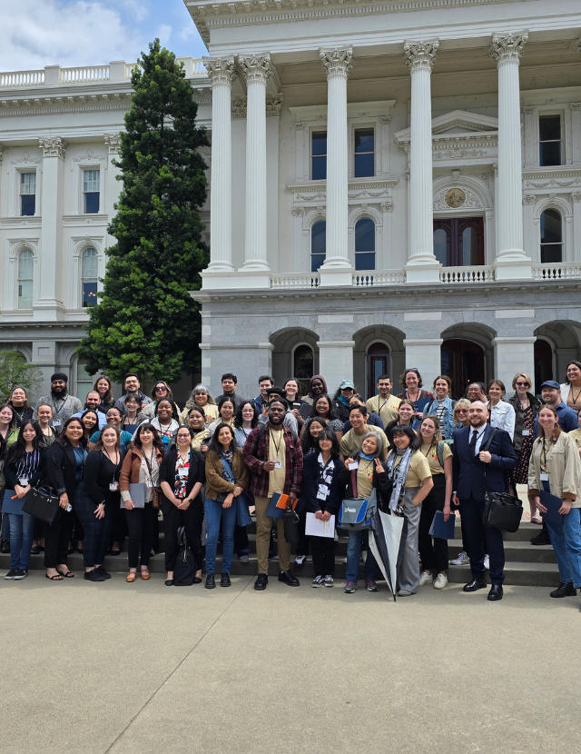 group of people in front of state capital on ENACT Day