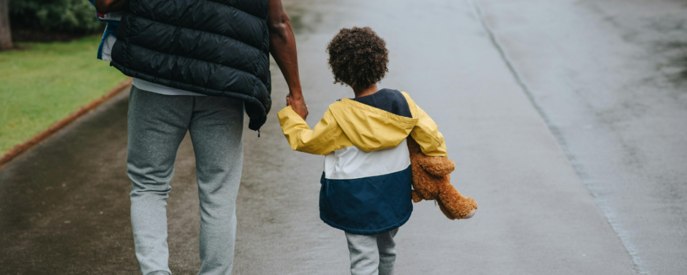 man walking with child