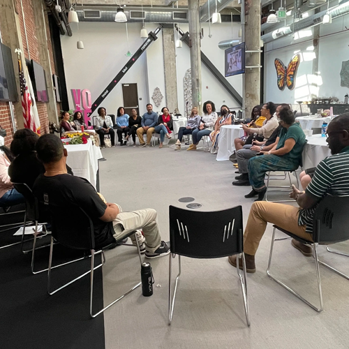 people sitting in circle at workshop