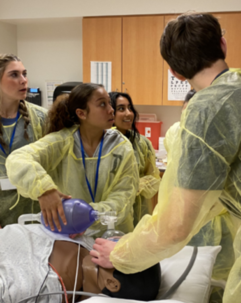 FACES high school participants learning CPR in a hospital setting